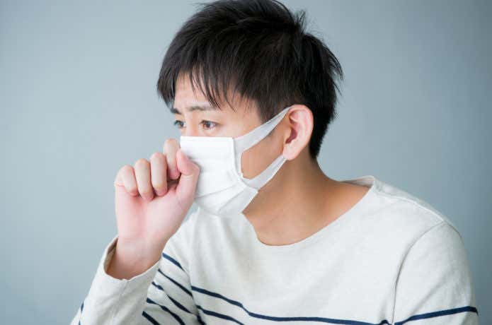 体調が悪い男性