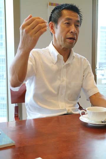 日高沢登りの話をする武石さん
