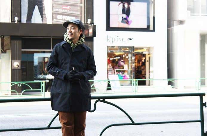 ノースフェイススタンダードのアイテムを着ている男性