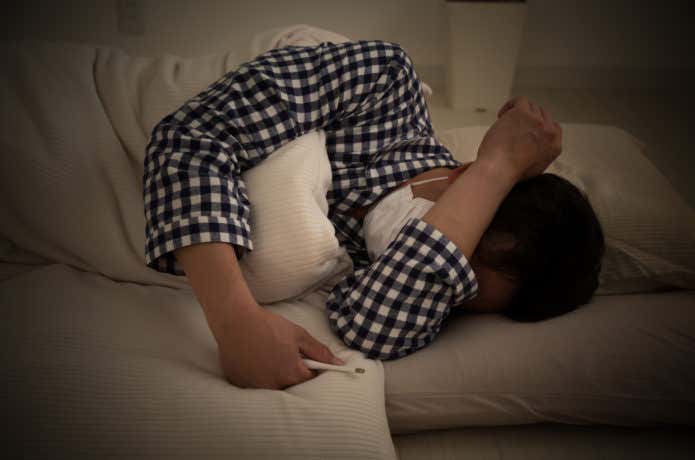 体調が悪い男性