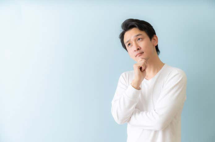 考える人