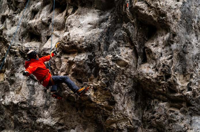 Dry tool climber testing new GORE-TEX PRO