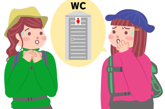 トイレを探している女性