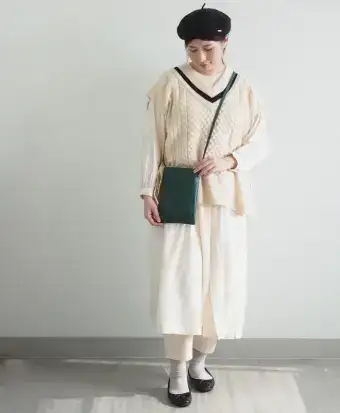 バトラーバーナーセイルズのサコッシュをまとう人
