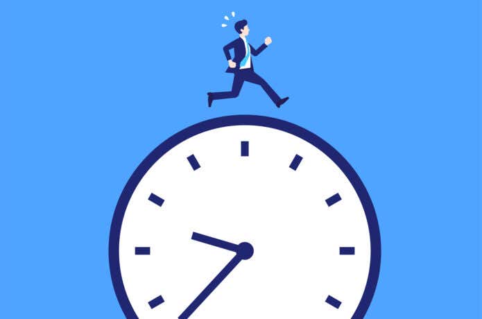 時計の上を走る人のイラスト