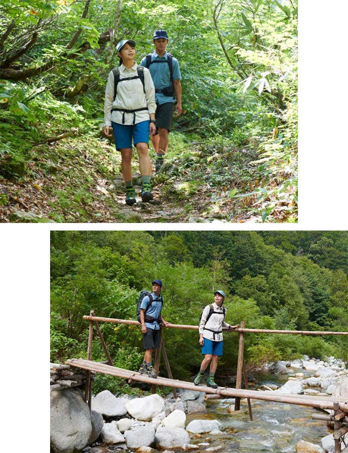 finetrack ストームゴージュアルパインハーフパンツを着用した男女の登山者