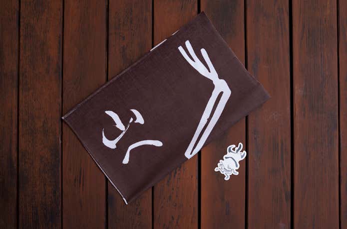 「ARC’TERYX TRAIL HUB TAKAO」の特典の手ぬぐいとステッカー